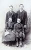 Nancy Ellen Clark Moore (1882-1908) with unidentified family members...